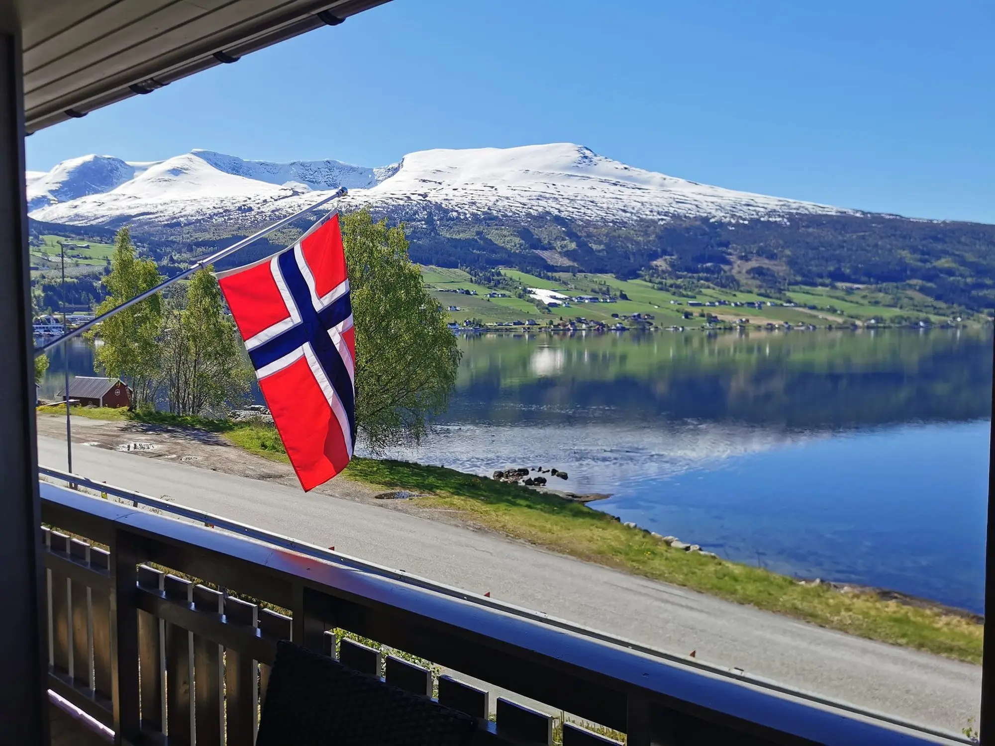 Fjord view with snow-capped mountains from Innvik, Stryn